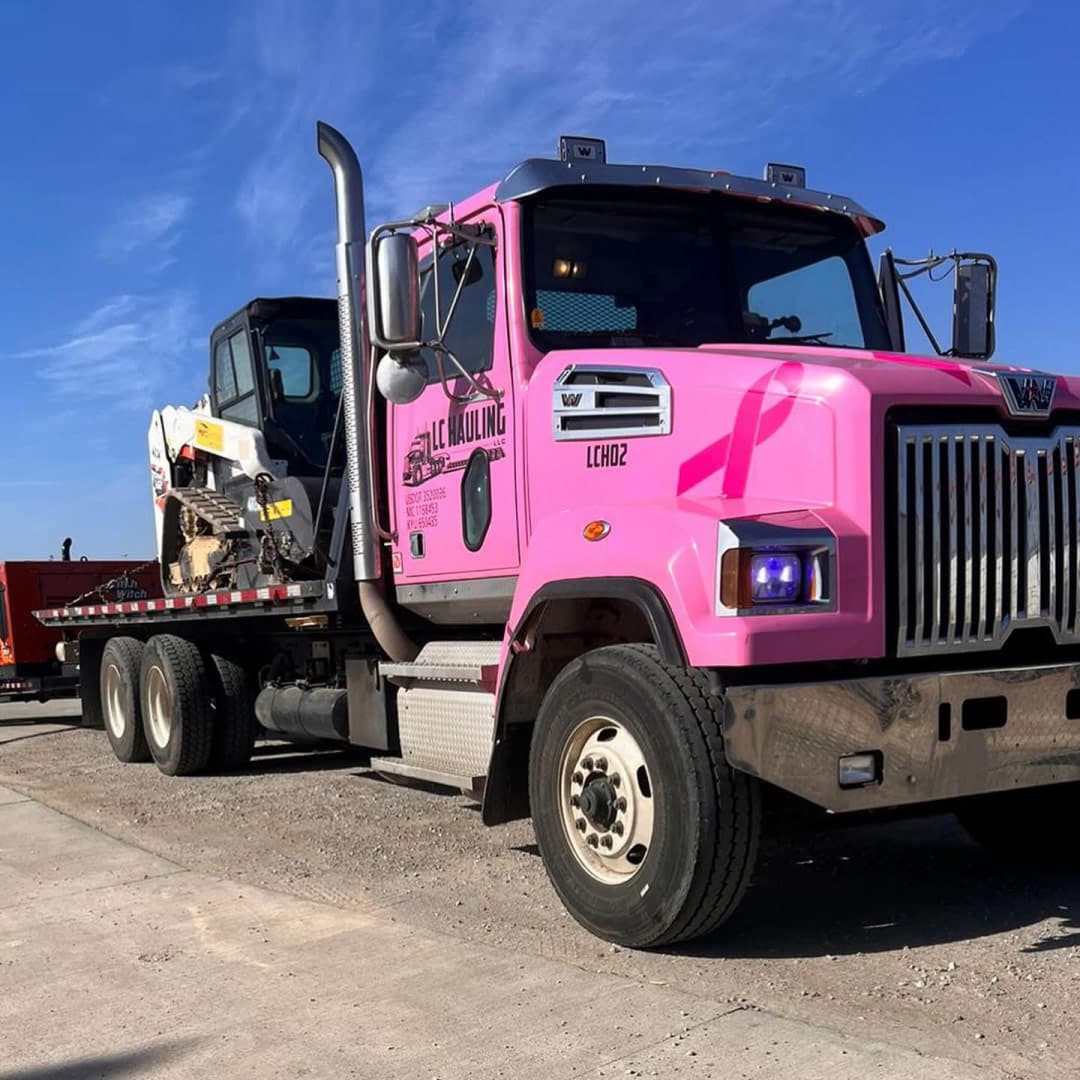 LC Hauling heavy equipment transport